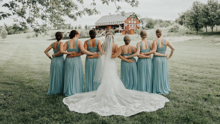 Bridal party posing together at Zion Springs wedding venue.