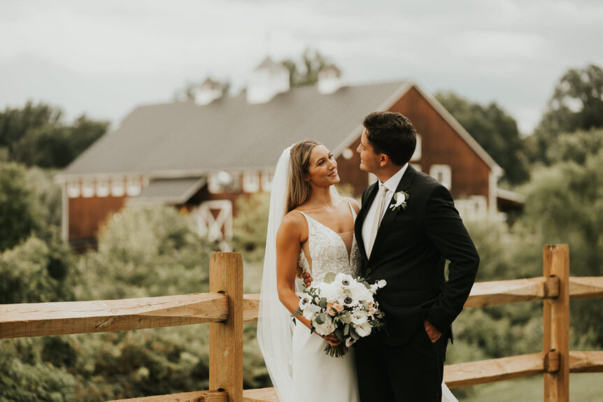 Elegant rustic barn at Zion Springs, offering a unique backdrop for bridal couple in Northern Virginia.