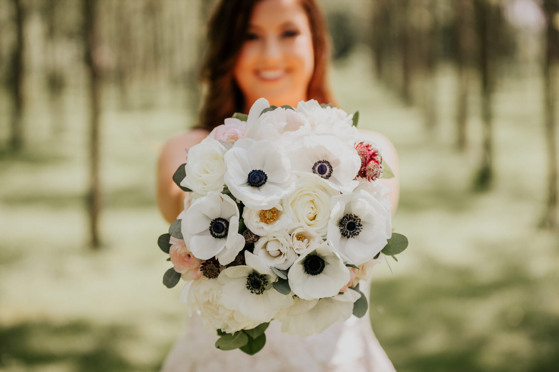 Zion Springs bridal bouquet white poppies