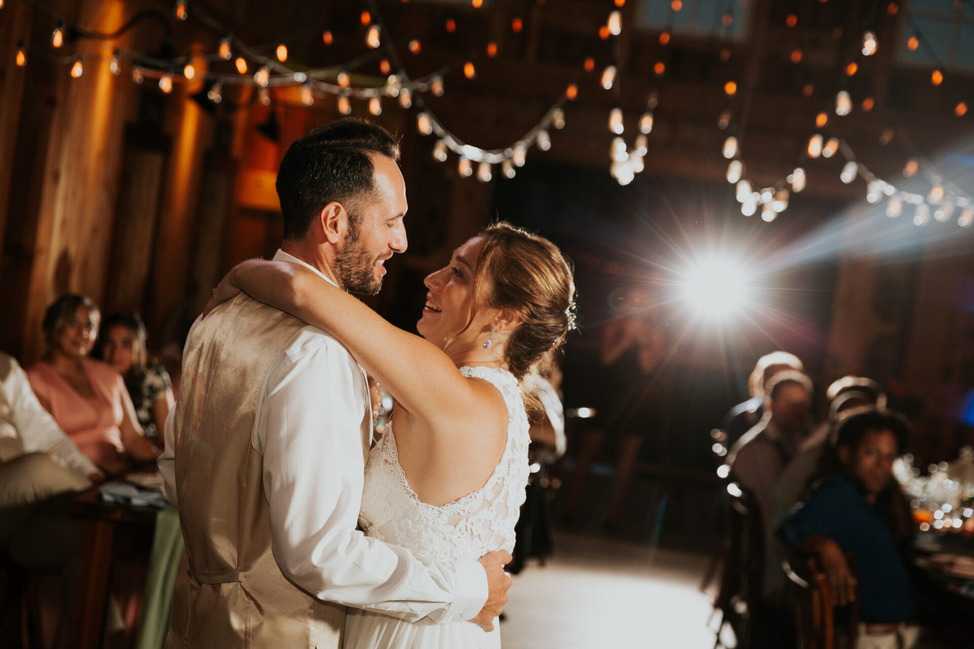 Zion Springs bride and groom dancing under twinkling lights