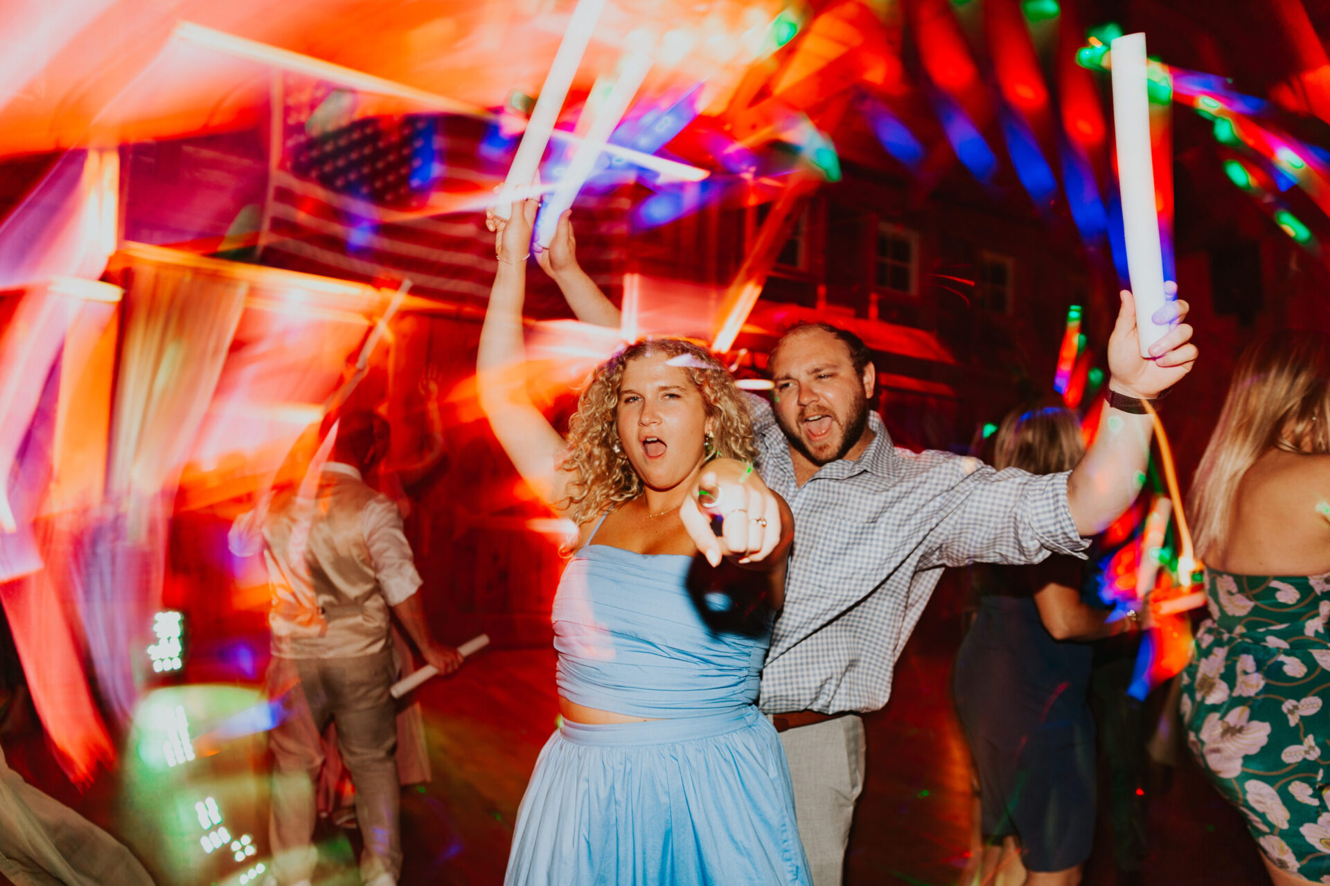Zion Springs couple dancing at reception with glow sticks