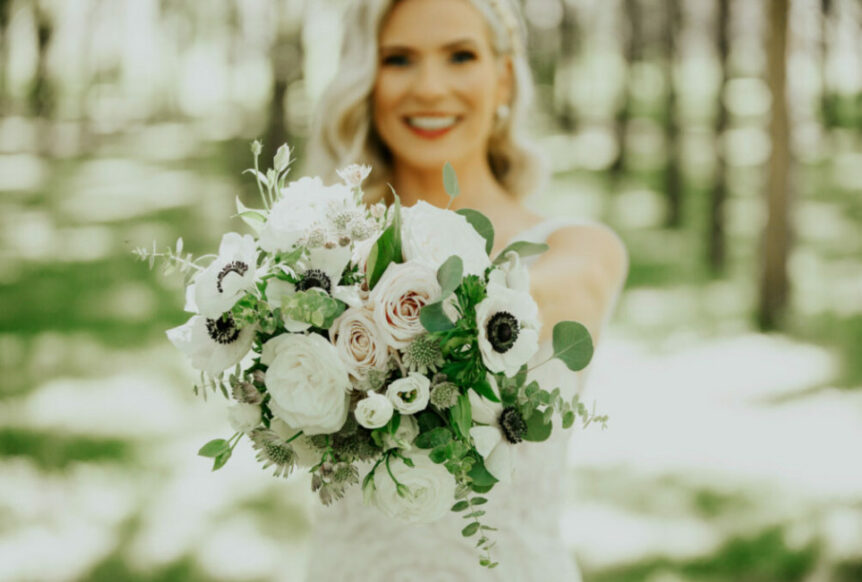 bride with bouquet at zion springs wedding venue