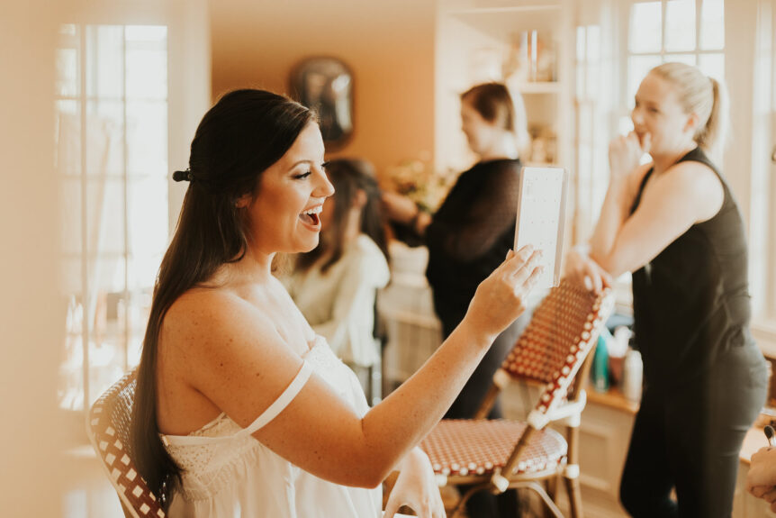 Bride-to-be enjoying a happy as she prepares for her wedding at Zion Springs, a rustic elegant wedding venue in Northern Virginia.