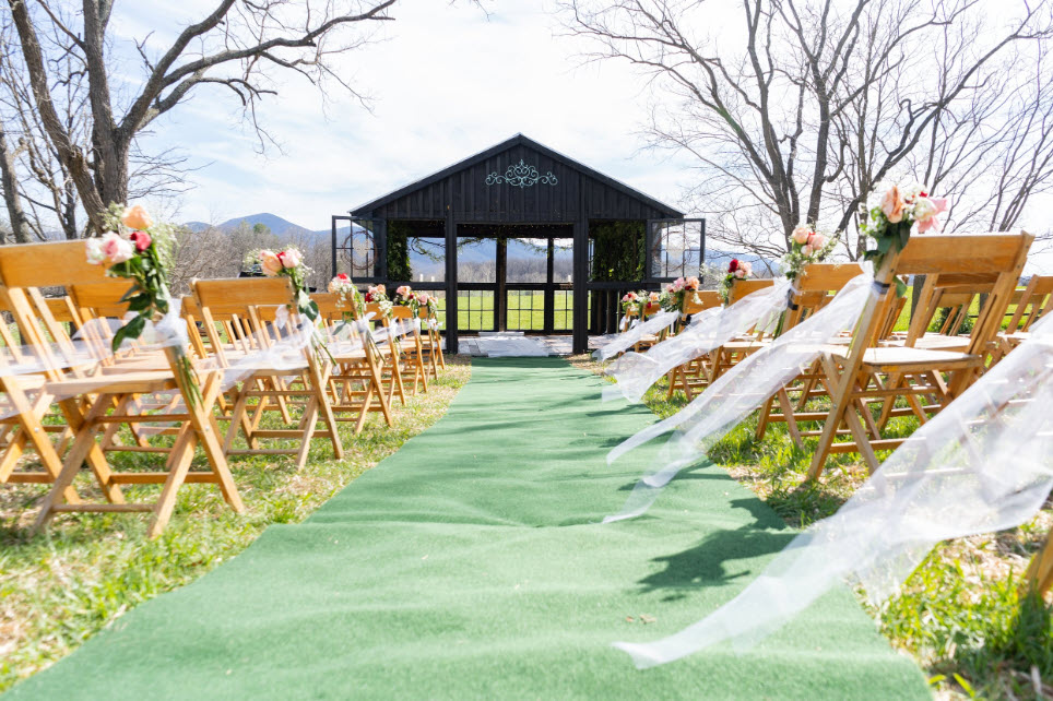 Intimate wedding ceremony at Cricket Chirp Farm, combining elegance with Virginia's natural beauty.