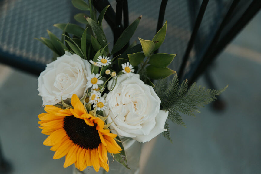 Exquisite floral arrangements decorating the aisle for a wedding ceremony at Zion Springs, Virginia.