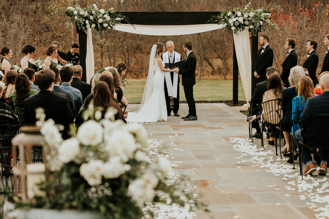 Wedding ceremony under pergola at Zion Springs