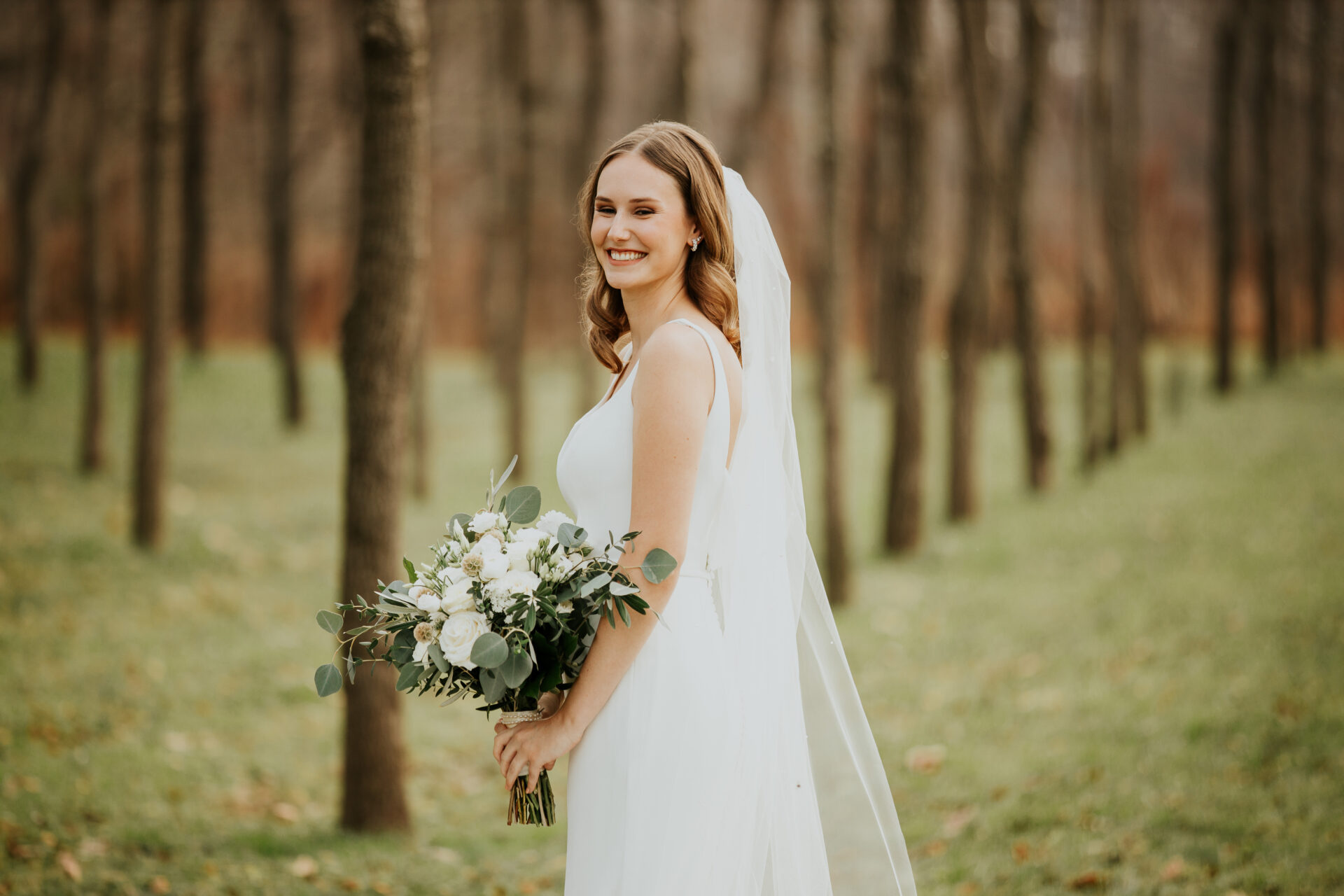 bride with bouquet in walnut grove Zion Springs