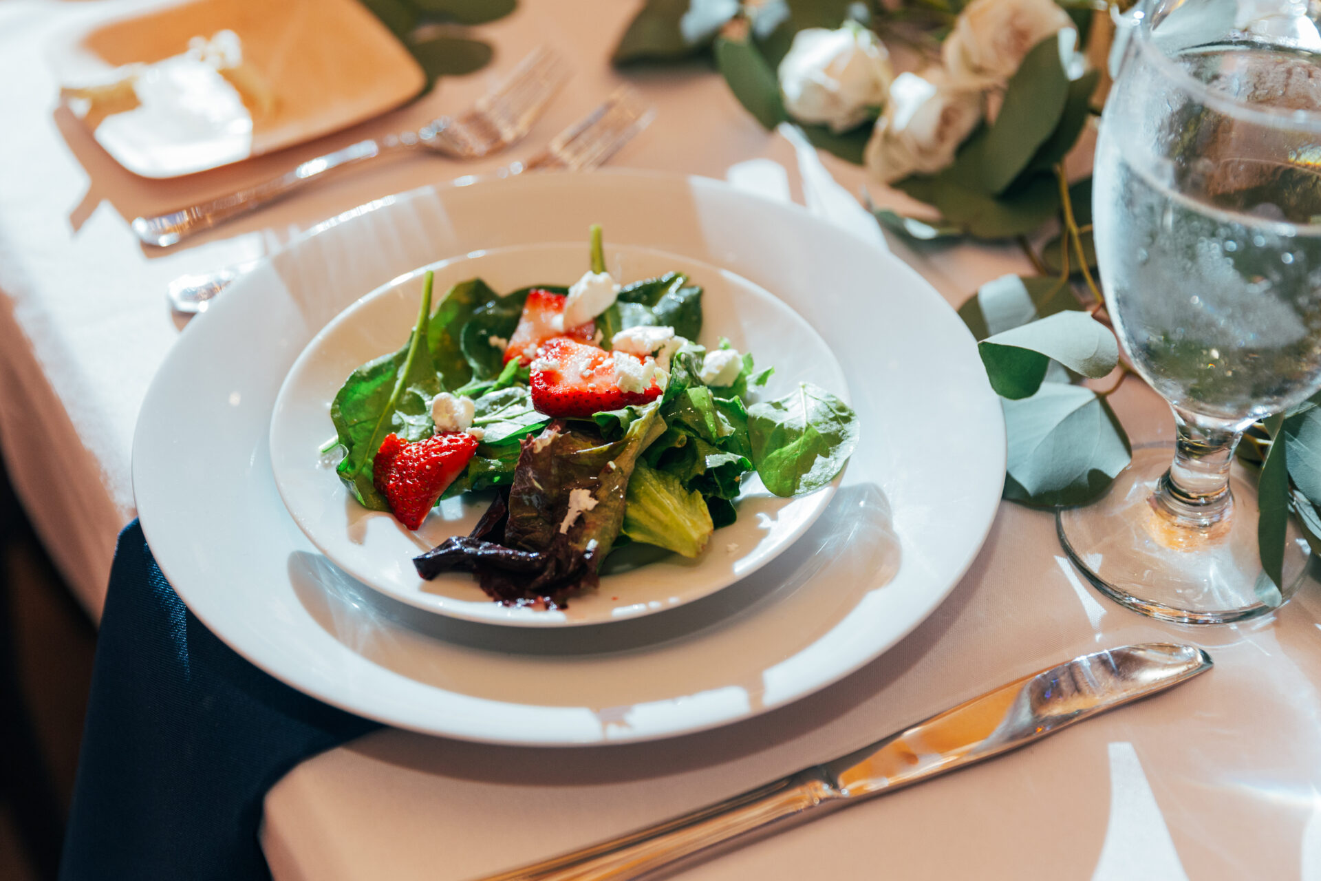 zion springs wedding rustic barn fresh salad on a white plate