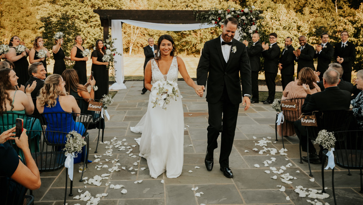 bride and groom walking up the aisle at Zion Springs