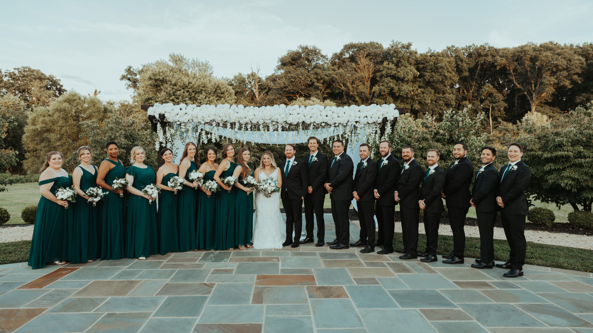 bride and groom with wedding party