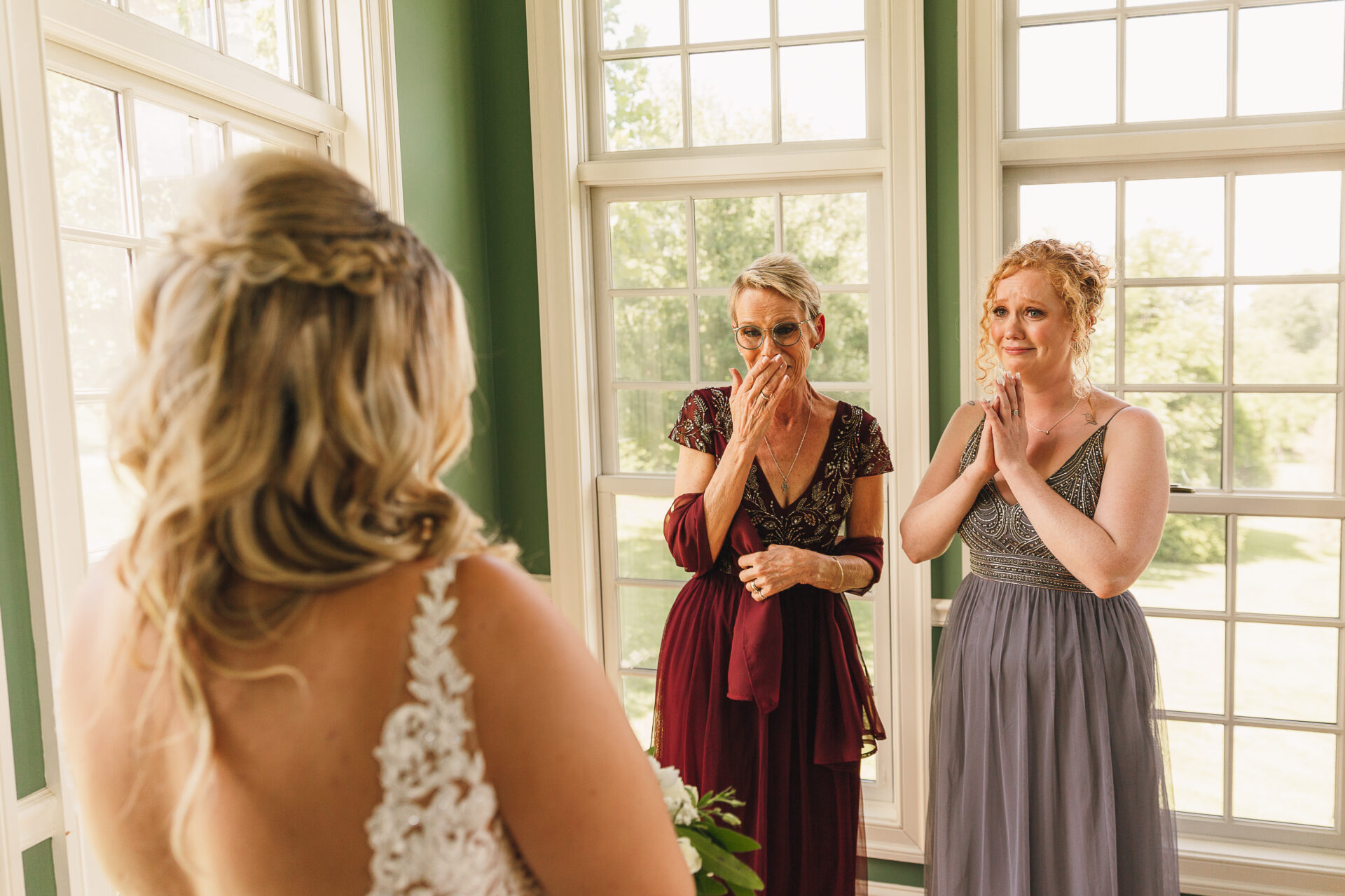 bride and family first look