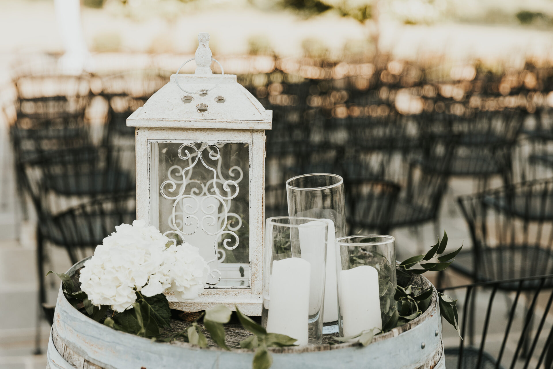 lantern and candles on a barrell