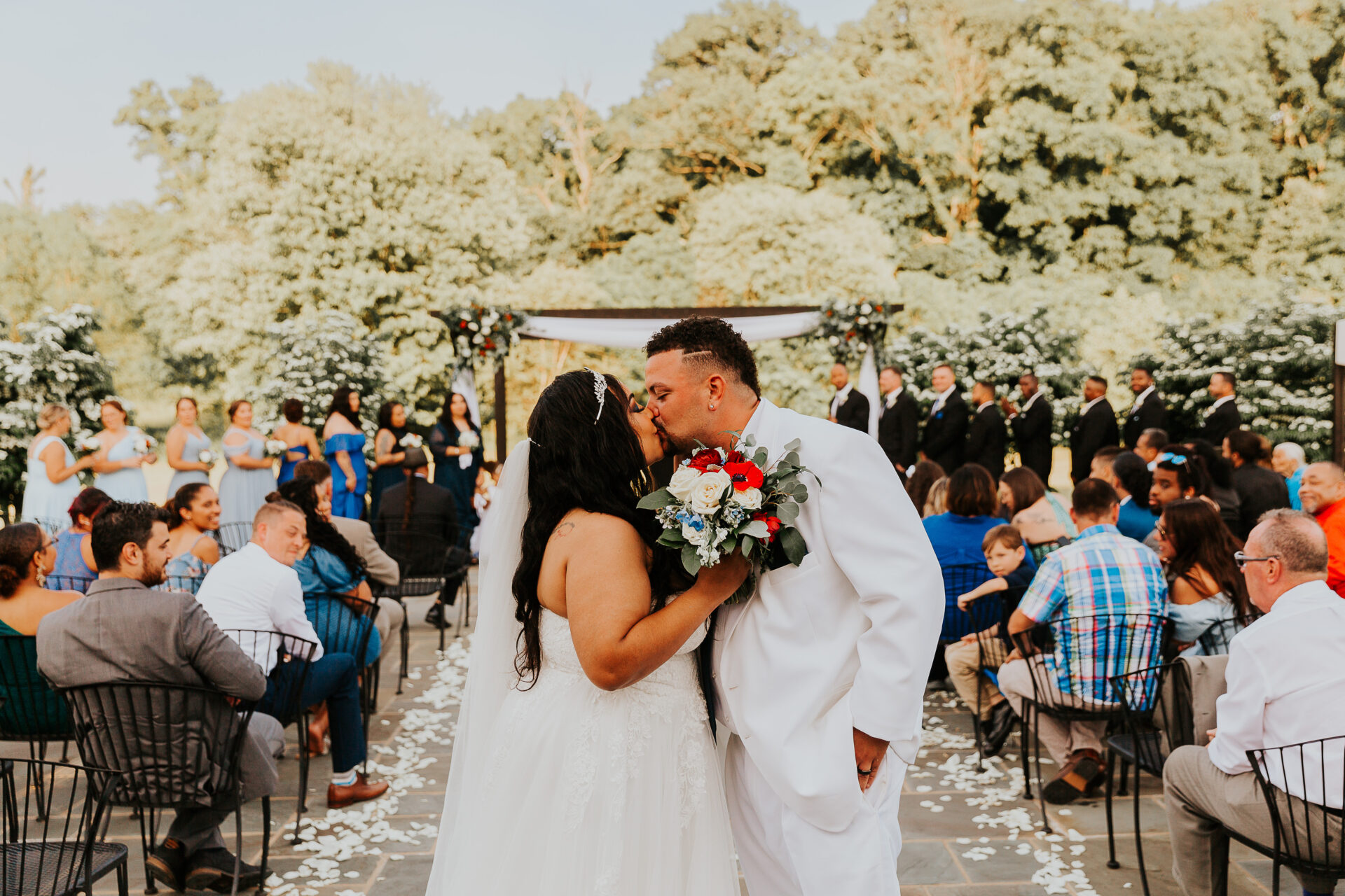 bride groom ceremony kiss