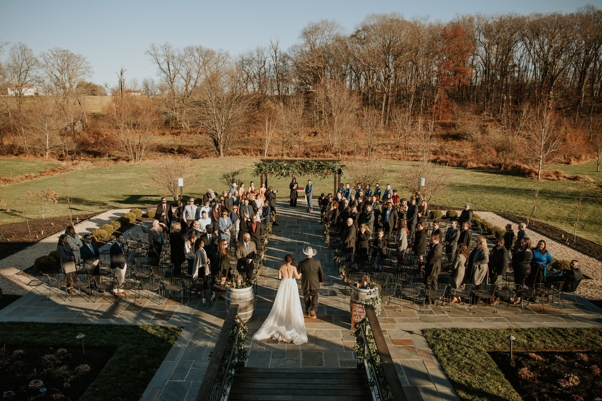 bride walking down aisle, winter wedding, rustic barn wedding venue