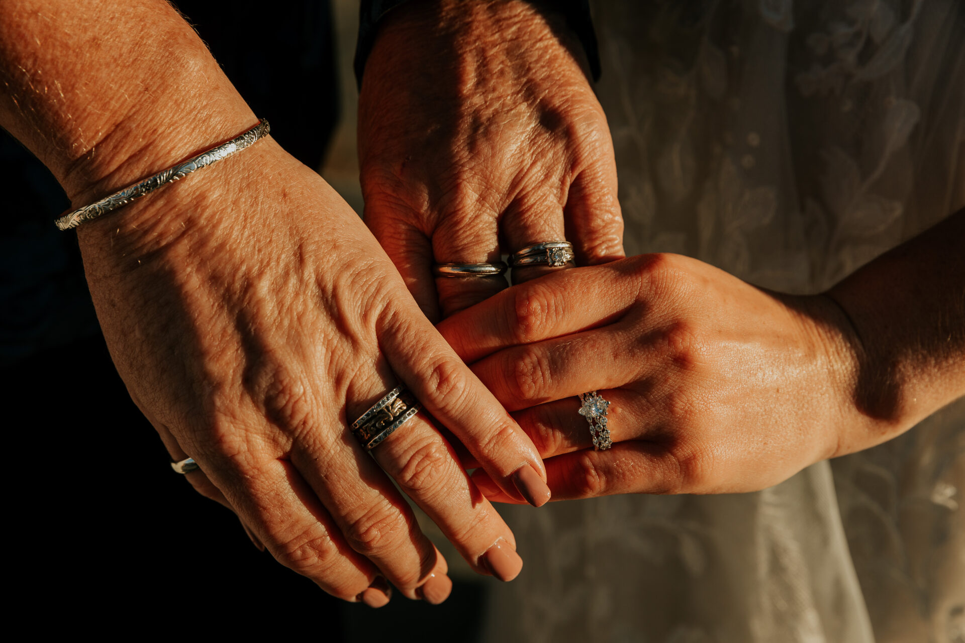 three generations, daughter, mother, grandmother, wedding rings