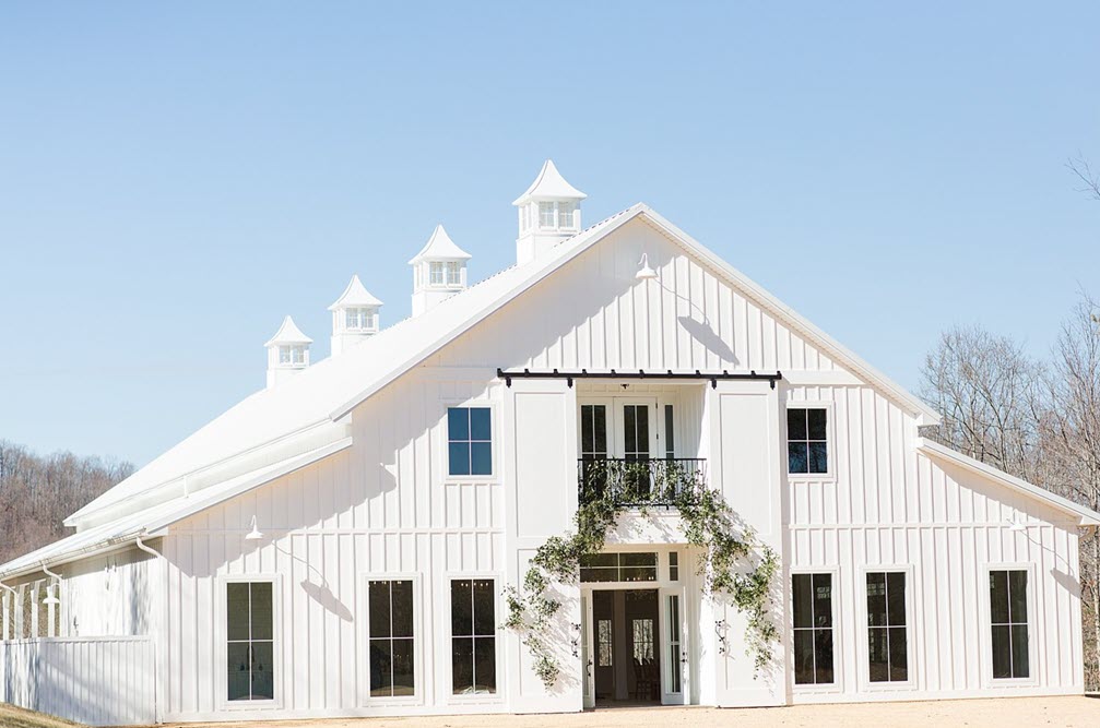 Elegant barn wedding setup at Ivy Rose Barn with panoramic views of Rocky Mount's landscape.