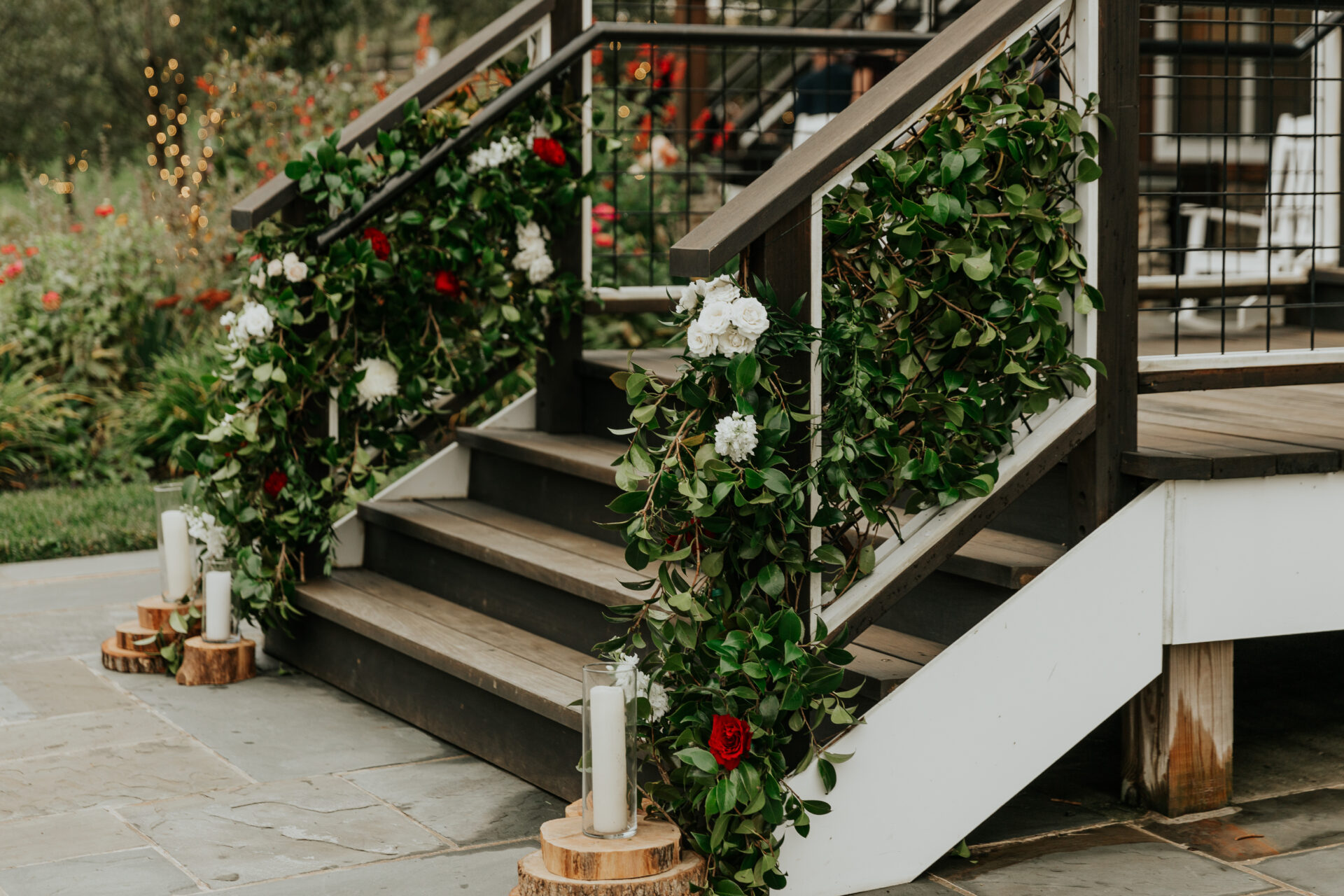 roses, wedding flowers, florals, rustic barn, stairs