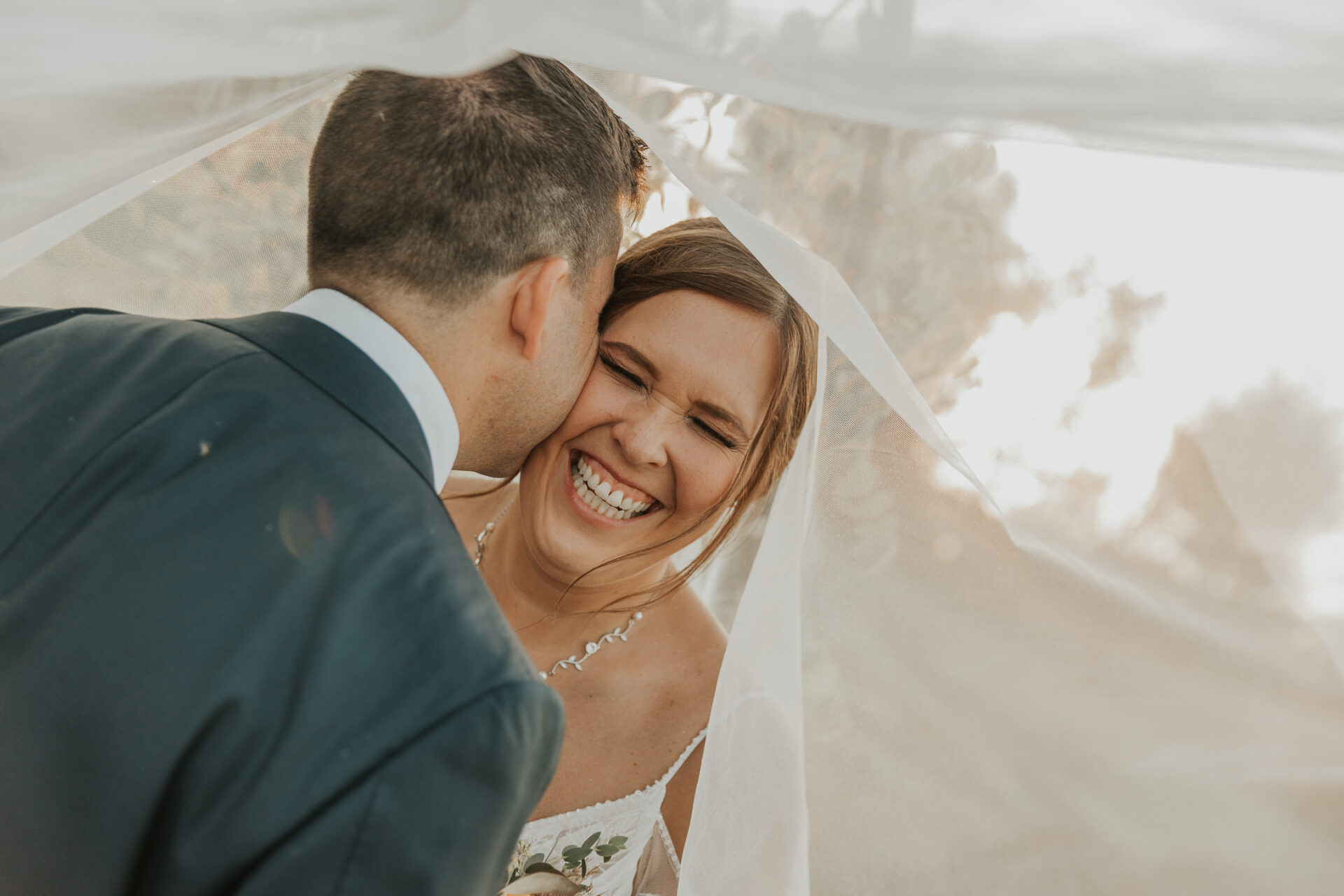 bride, groom, wedding veil