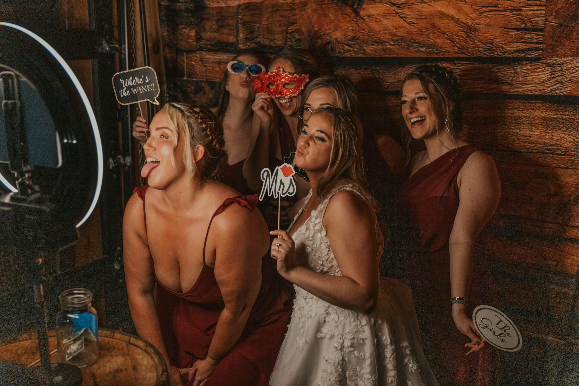 photo booth, bride, bridesmaids, rustic barn