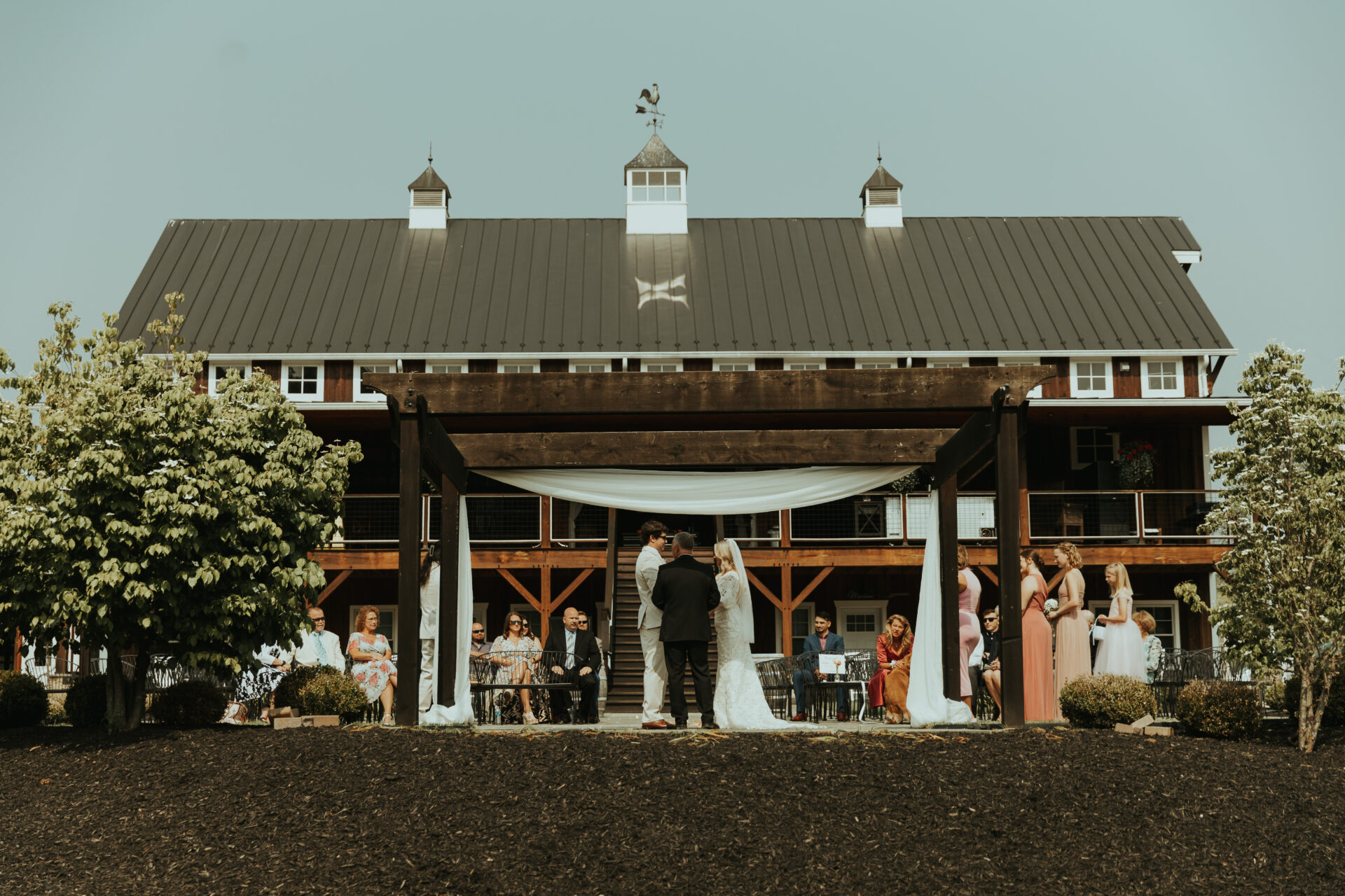 wedding ceremony, bride groom, rustic barn pergola