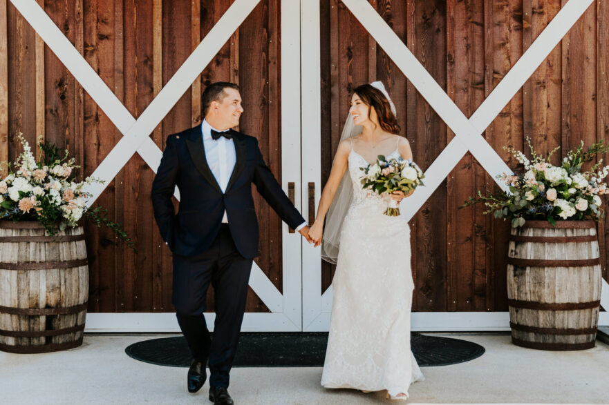 Bride and groom celebrating at Zion Springs in Northern Virginia during their weekend wedding.